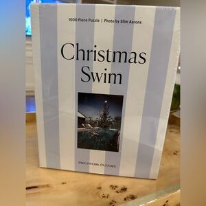 Slim Aaron’s “Christmas Swim” 1,000 Piece Puzzle by Piecework Puzzles